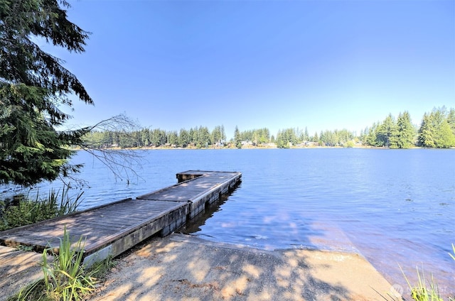 dock featuring a water view and a boat ramp