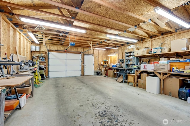 garage with a workshop area