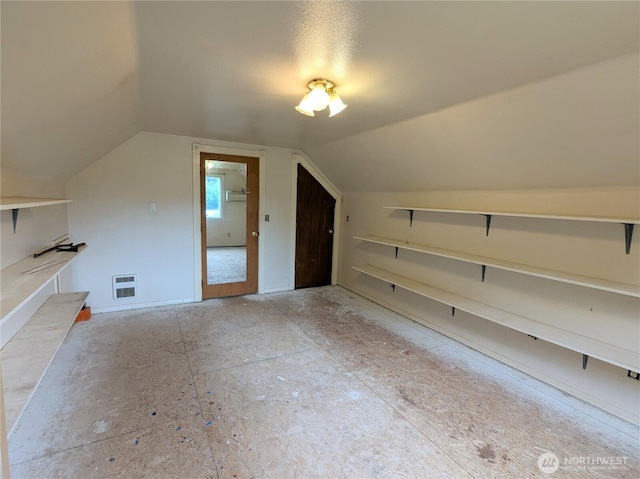 bonus room with lofted ceiling