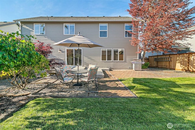back of house featuring a patio area
