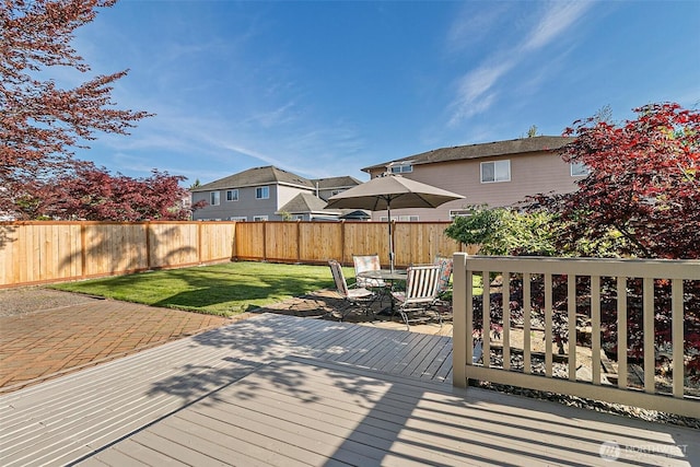 wooden deck with a residential view