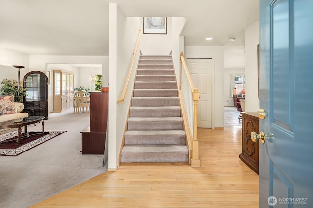 19021 113th Way SE, Renton, WA 98055 - stairs featuring healthy amount of natural light, wood finished floors, and recessed lighting