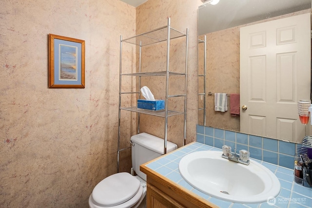 19021 113th Way SE, Renton, WA 98055 - bathroom with tasteful backsplash, toilet, and vanity