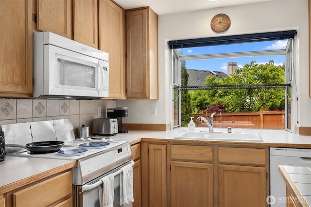 19021 113th Way SE, Renton, WA 98055 - kitchen with white appliances, a sink, light countertops, and tasteful backsplash