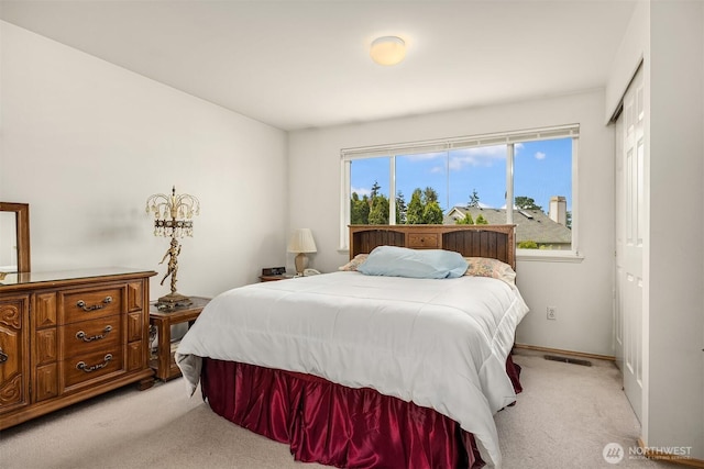 19021 113th Way SE, Renton, WA 98055 - bedroom featuring light colored carpet, a closet, and baseboards