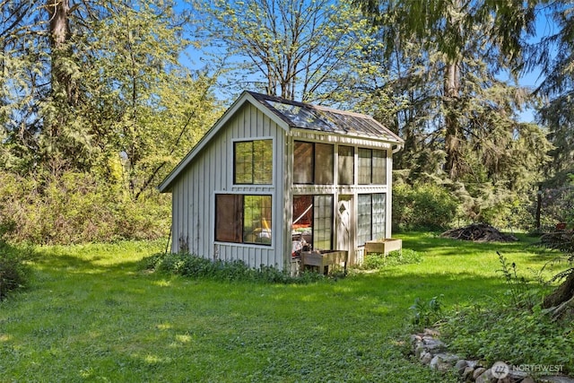 view of outbuilding with an outbuilding