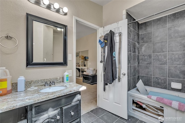 full bathroom featuring tile patterned floors, shower / bathing tub combination, and vanity