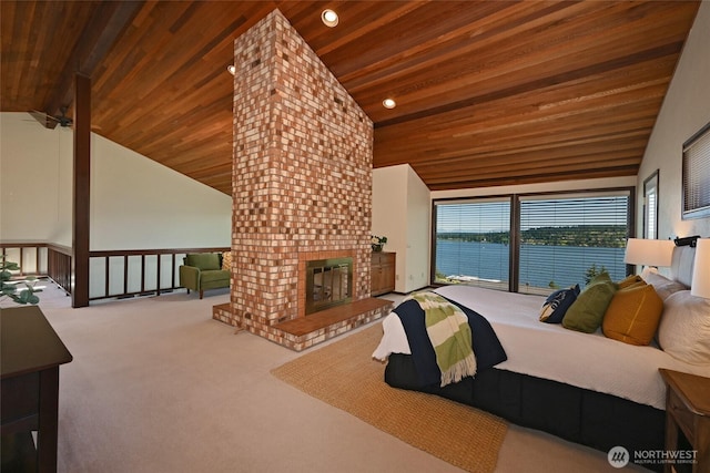3911 NE 158th Ln, Lake Forest Park, WA 98155 - bedroom featuring lofted ceiling, carpet, wooden ceiling, a fireplace, and a water view