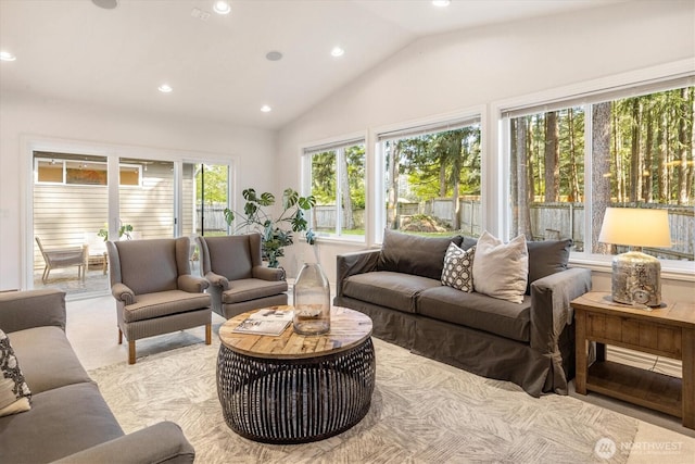 living room with recessed lighting and vaulted ceiling