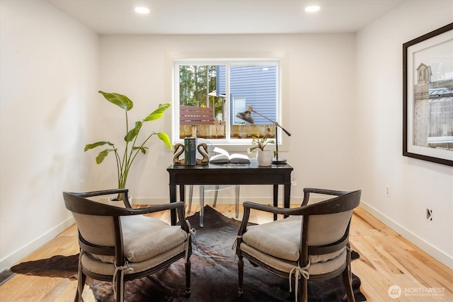 home office with light wood finished floors, recessed lighting, and baseboards