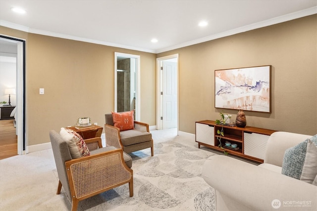 living area with crown molding, light colored carpet, baseboards, and recessed lighting