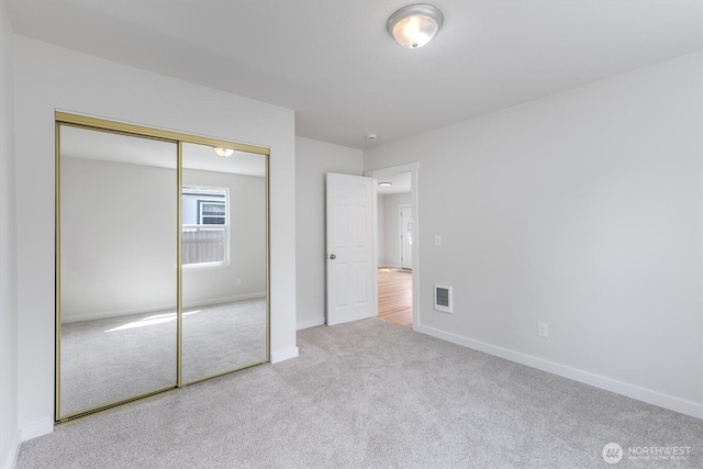 103 Madison St, Ryderwood, WA 98581 - unfurnished bedroom with carpet floors, baseboards, and a closet