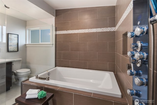 full bath with tiled tub, toilet, vanity, and a shower
