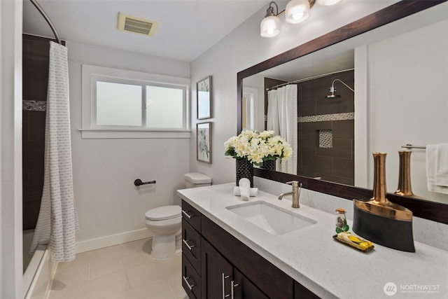 full bathroom featuring baseboards, toilet, vanity, and tile patterned flooring