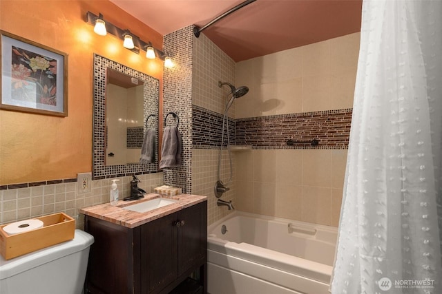 1203 Tower Ave, Raymond, WA 98577 - bathroom with tile walls, shower / tub combo, toilet, and vanity