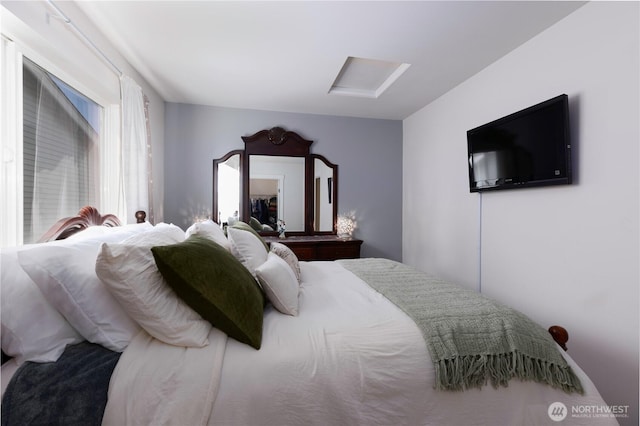 bedroom with attic access