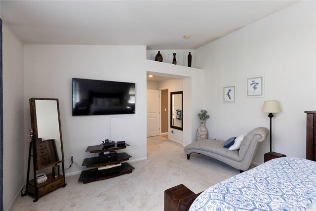 bedroom with carpet floors and baseboards