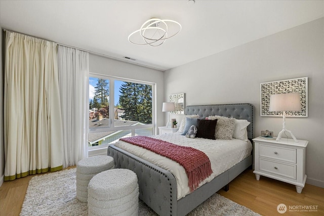 bedroom featuring wood finished floors