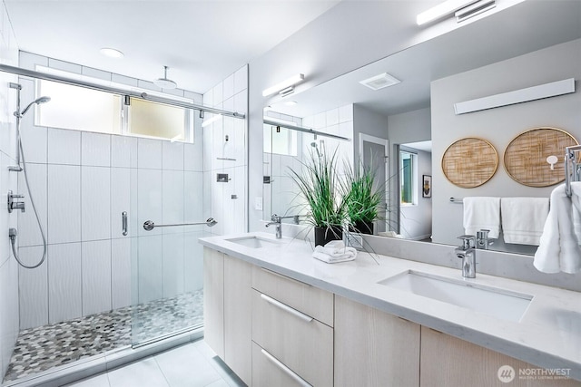 1709 NW 64th St, Seattle, WA 98107 - full bath with healthy amount of natural light, a stall shower, and double vanity