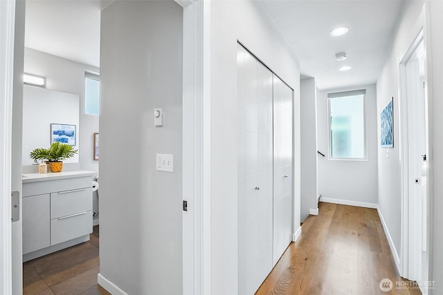 1709 NW 64th St, Seattle, WA 98107 - corridor featuring baseboards, recessed lighting, and wood finished floors