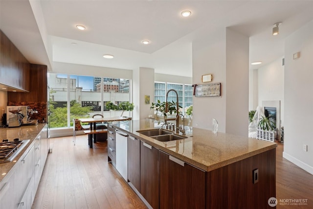 1920 4th Ave Unit 502, Seattle, WA 98101 - kitchen featuring a sink, modern cabinets, healthy amount of natural light, and recessed lighting