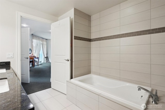 1920 4th Ave Unit 502, Seattle, WA 98101 - full bathroom featuring tiled bath, tile patterned floors, and vanity