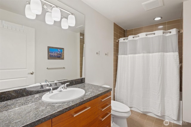 1920 4th Ave Unit 502, Seattle, WA 98101 - full bath with shower / bath combo, vanity, and toilet