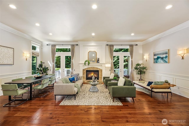 8380 SE 43rd St, Mercer Island, WA 98040 - living room featuring crown molding, a decorative wall, french doors, and a healthy amount of sunlight