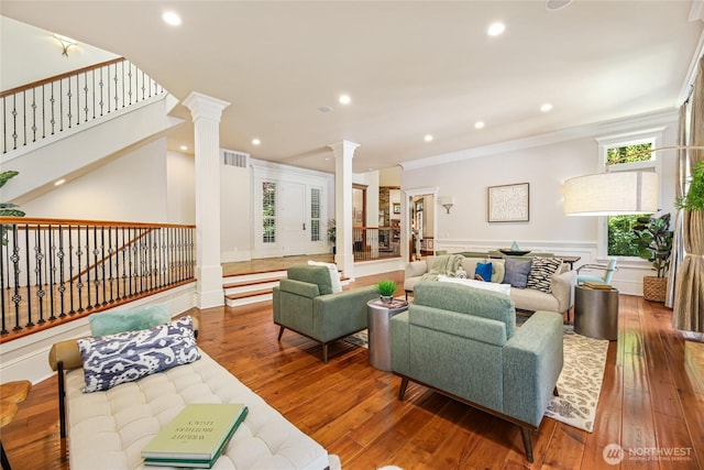 8380 SE 43rd St, Mercer Island, WA 98040 - living room with ornamental molding, wood-type flooring, visible vents, and ornate columns