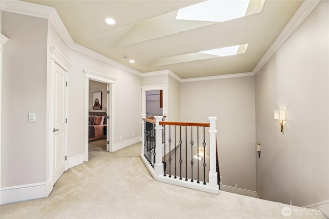 8380 SE 43rd St, Mercer Island, WA 98040 - hallway with recessed lighting, crown molding, light carpet, an upstairs landing, and a skylight