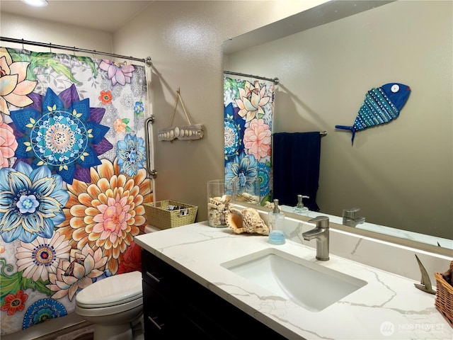 735 Dover Ct SE, Ocean Shores, WA 98569 - full bath with vanity, toilet, and curtained shower