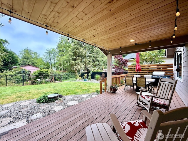 735 Dover Ct SE, Ocean Shores, WA 98569 - deck with outdoor dining space and grilling area