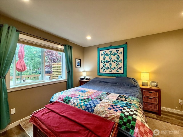 735 Dover Ct SE, Ocean Shores, WA 98569 - bedroom featuring baseboards, wood finished floors, and recessed lighting