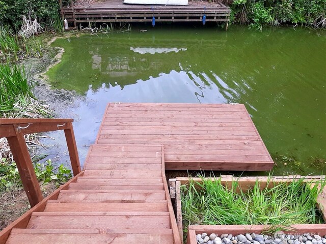 735 Dover Ct SE, Ocean Shores, WA 98569 - dock area featuring a water view
