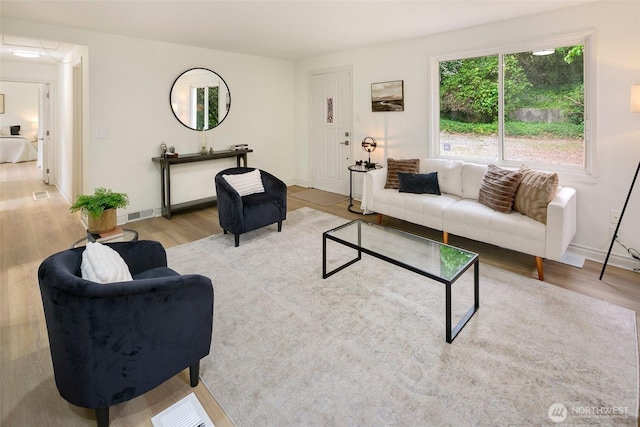 12635 Beacon Ave S, Seattle, WA 98178 - living area with wood finished floors and baseboards