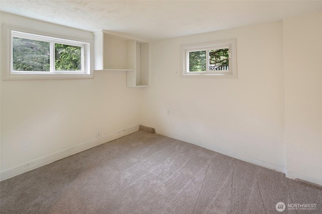 12635 Beacon Ave S, Seattle, WA 98178 - unfurnished room with carpet flooring and baseboards
