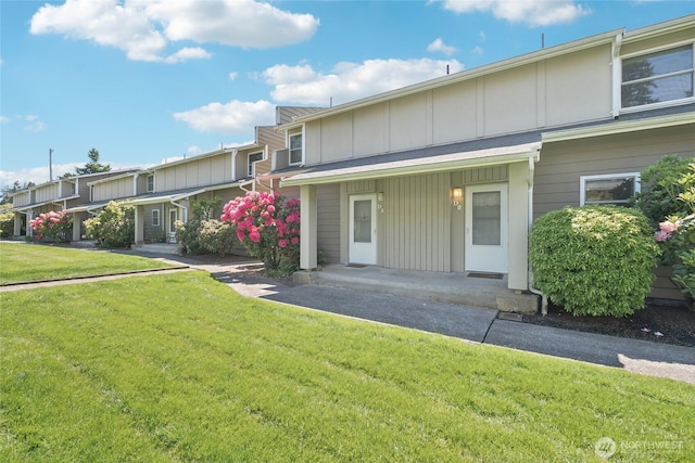 18530 52nd Ave W Unit D2, Lynnwood, WA 98037 - townhome / multi-family property featuring board and batten siding and a front lawn