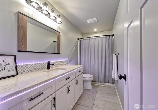 1827 Double Ditch Ct, Lynden, WA 98264 - bathroom featuring toilet, vanity, and recessed lighting
