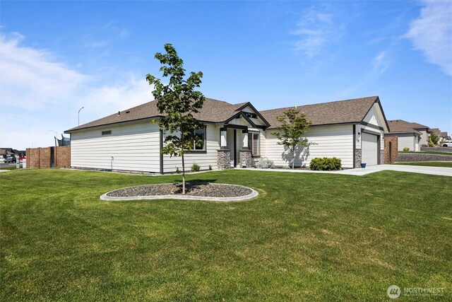 3504 Kathren Ln, Pasco, WA 99301 - single story home with a front yard, driveway, a garage, and a shingled roof