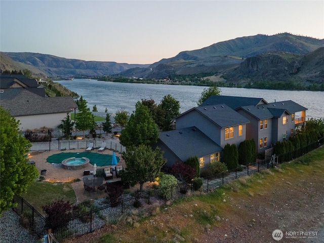 31 S Shore Dr, Orondo, WA 98843 - aerial view at dusk of a water and mountain view