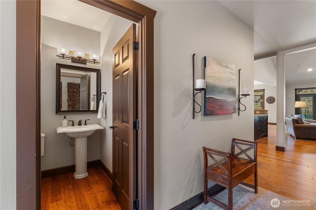 31 S Shore Dr, Orondo, WA 98843 - hall with light wood-type flooring, baseboards, and a sink