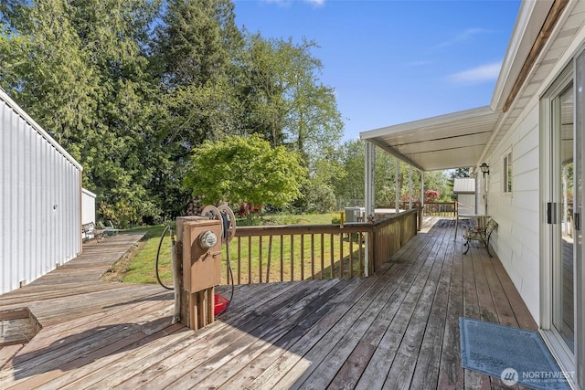 deck featuring a yard