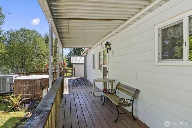 deck with central air condition unit