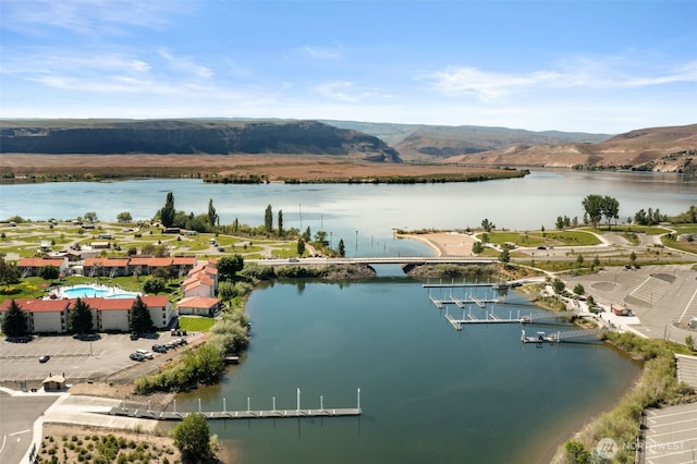 bird's eye view of a water and mountain view
