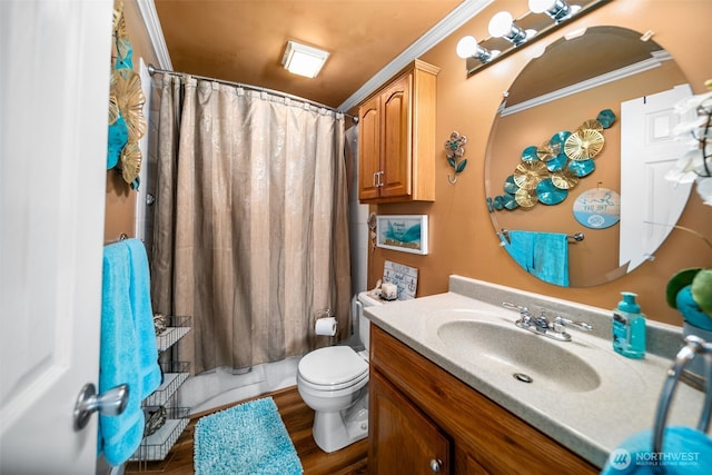 bathroom featuring toilet, vanity, ornamental molding, wood finished floors, and shower / tub combo with curtain