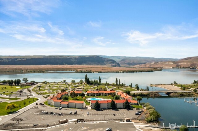 bird's eye view of a water and mountain view