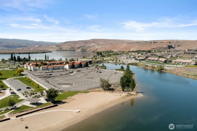 bird's eye view of a water and mountain view