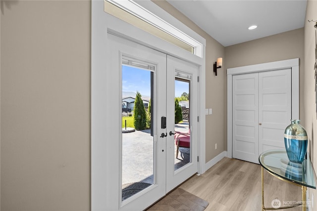 419 Edgewater Way SW, Mattawa, WA 99349 - doorway with french doors, light wood finished floors, baseboards, and recessed lighting