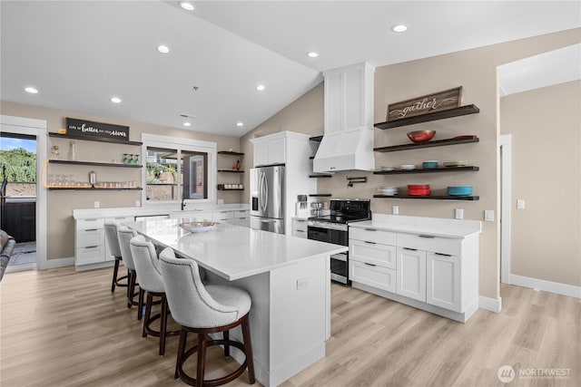 419 Edgewater Way SW, Mattawa, WA 99349 - kitchen with open shelves, stainless steel appliances, white cabinets, a kitchen island, and light countertops