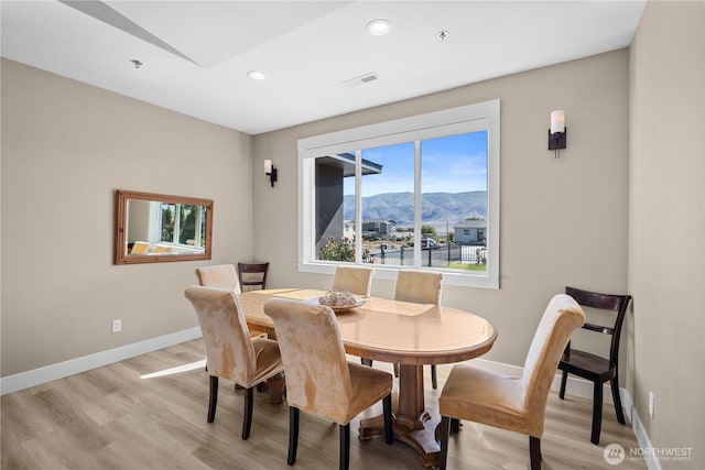419 Edgewater Way SW, Mattawa, WA 99349 - dining space featuring a mountain view, plenty of natural light, light wood finished floors, baseboards, and recessed lighting
